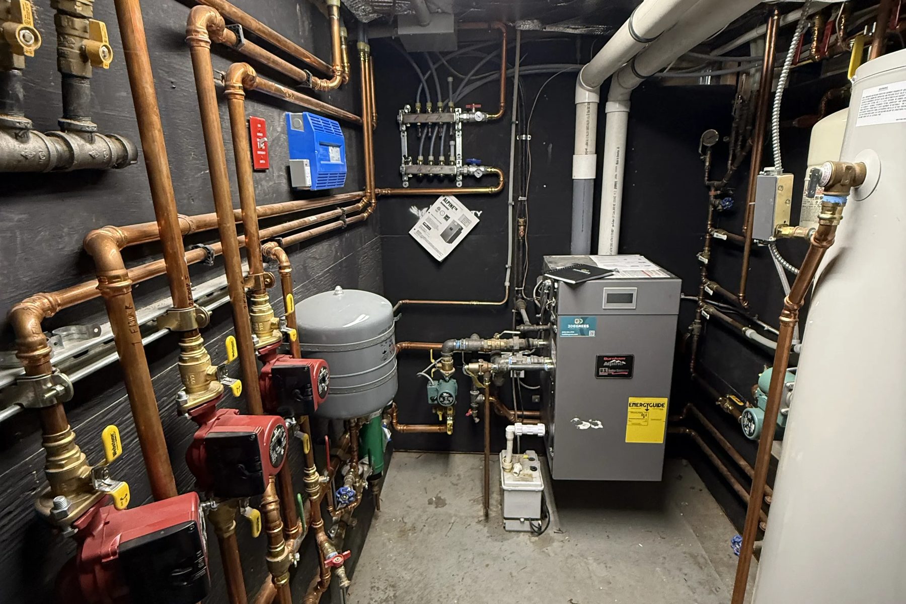 3Degrees technician servicing a residential boiler